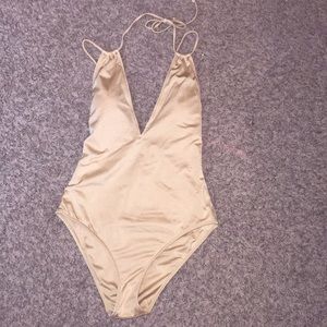 Gold one piece NWT